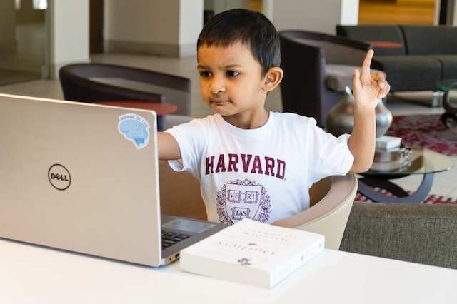young kid using a coding language